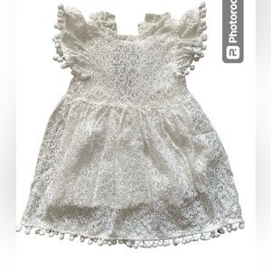 Adorable white dress for special occasions, perfect for birthdays and weddings